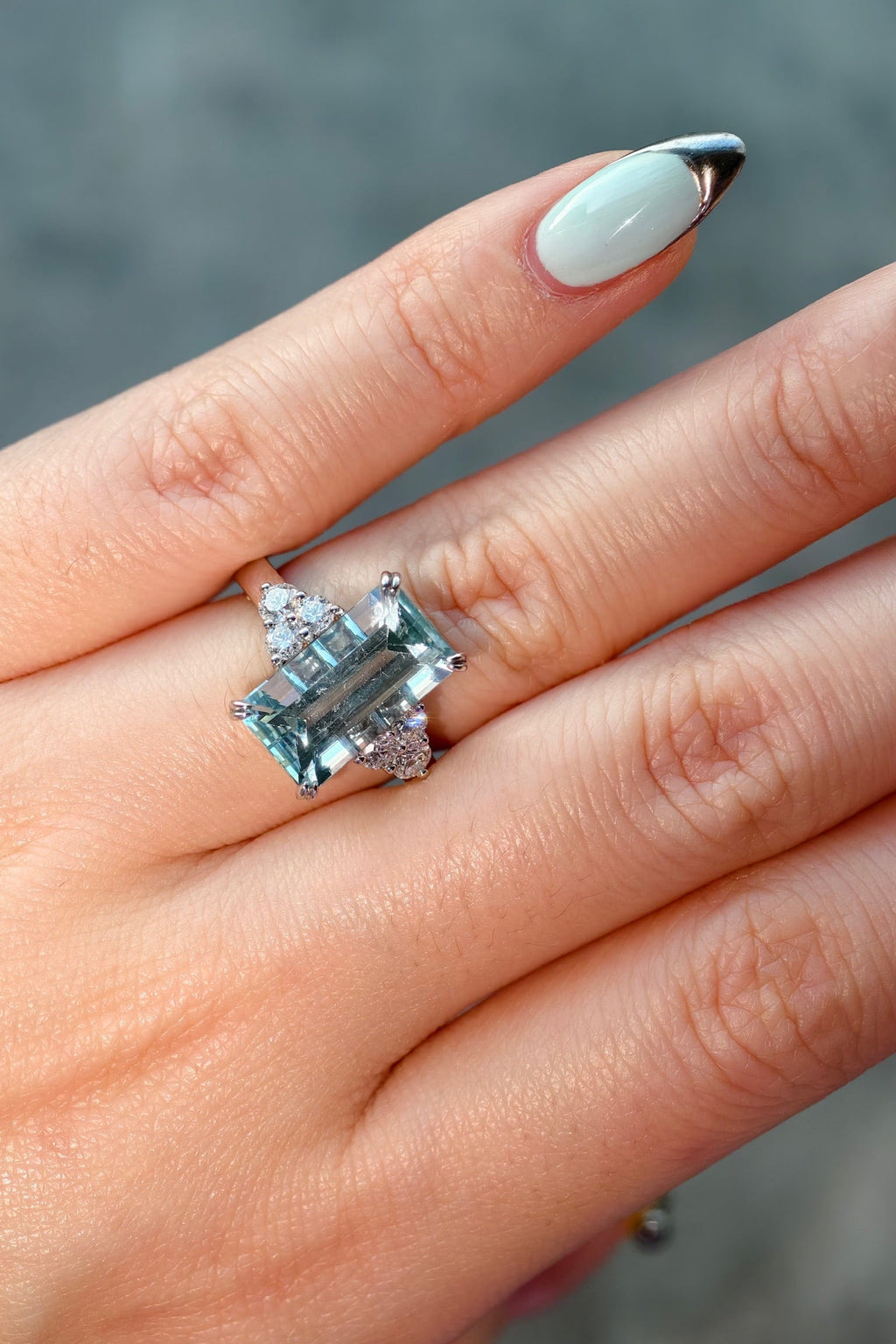 4.9 Carat Emerald Cut Aquamarine Ring set in 14K Gold and Lab Diamonds