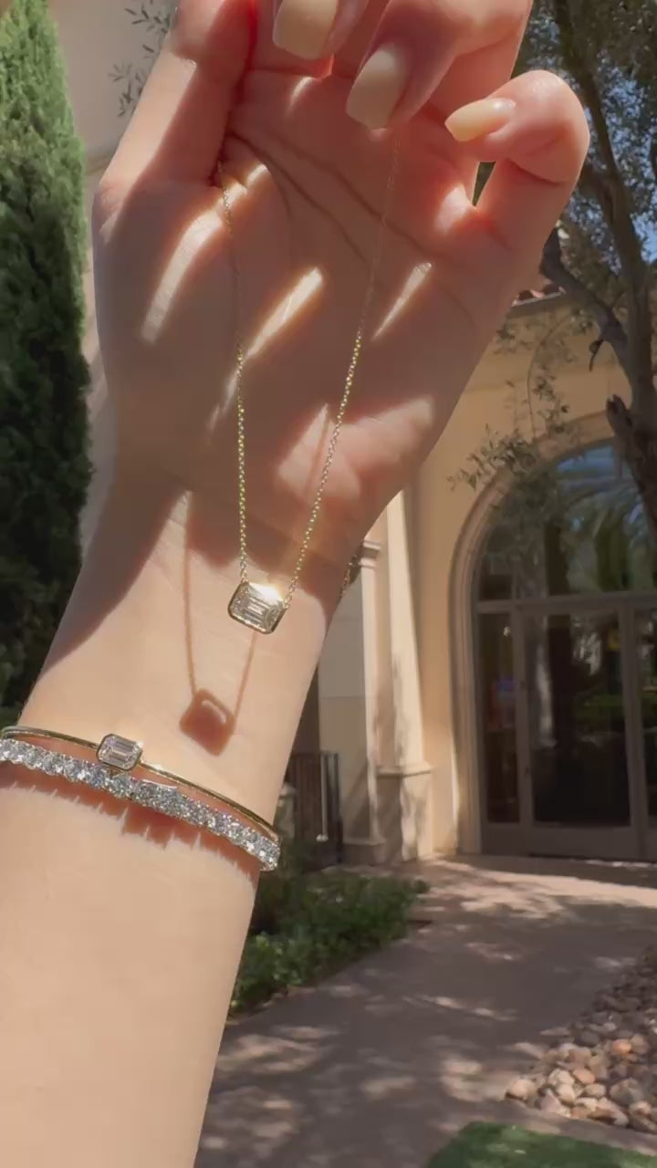 2 Carat Emerald-Cut Diamond Bezel Ring in 18K Yellow Gold