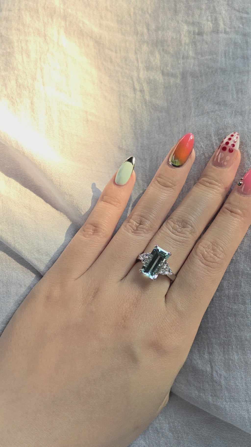 4.9 Carat Emerald Cut Aquamarine Ring set in 14K Gold and Lab Diamonds